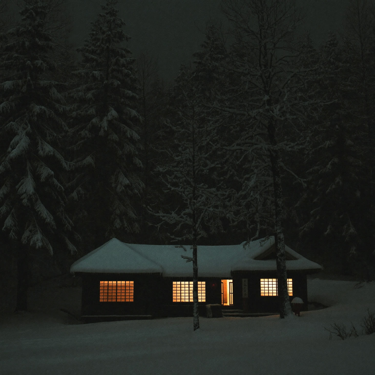 Snowy Japanese house glowing warmly at night